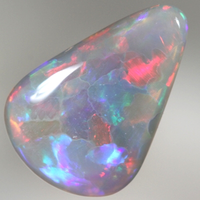 SOLID SEMI BLACK OPAL Bright fire. RARE Jigsaw pattern